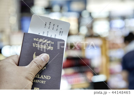 Left Hand Holding Thailand Passport 44148465