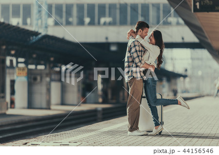 Happy woman talking with pleased male outdoor 44156546