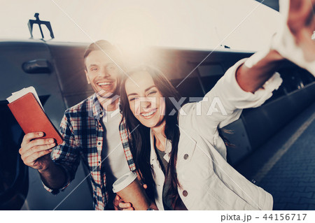 Positive girl and man doing photo outside 44156717