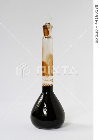 Petroleum sample in chemical glass on white 44160188