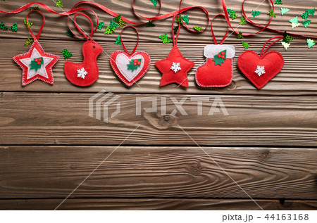 Handmade rustic red Christmas tree decorations Handmade rustic red Christmas tree decorations 44163168
