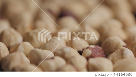 closeup roasted hazelnuts background 44164030