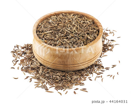 Caraway seeds in wooden bowl isolated on white background 44164031