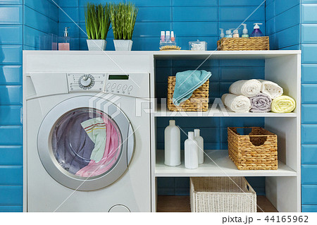 modern bathroom with washing machine 44165962