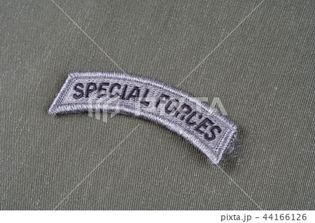 US ARMY special forces tab on olive green uniform US ARMY special forces tab on olive green uniform 44166126