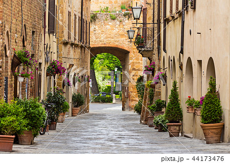 Beautiful street in a small old village Pienza, Tuscany. Beautiful street in a small old village Pienza, Tuscany. 44173476