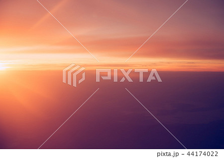 Sunrise sky from the airplane window Sunrise sky from the airplane window 44174022
