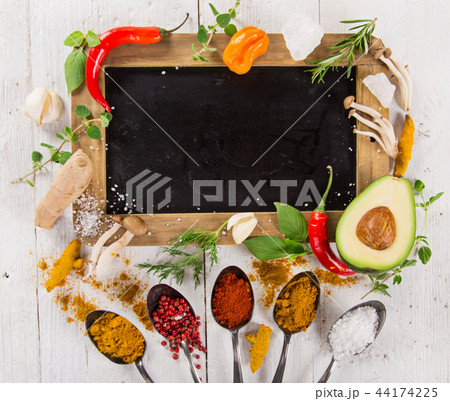 Various colorful spices on wooden table 44174225
