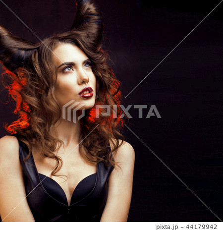 bright mysterious woman with horn hair, halloween celebration bright mysterious woman with horn hair, halloween celebration 44179942