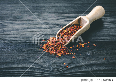 dry hot pepper in a scoop dry hot pepper in a scoop 44180463