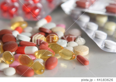 Assorted pills on the table Assorted pills on the table 44183626