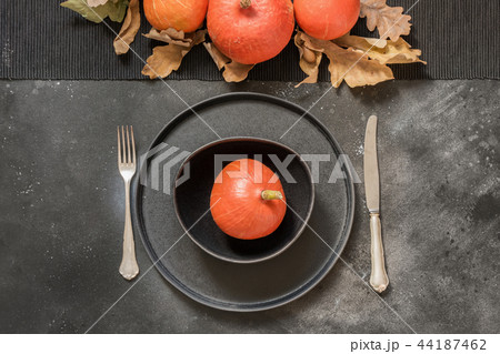 Thanksgiving Day table place setting on black. 44187462