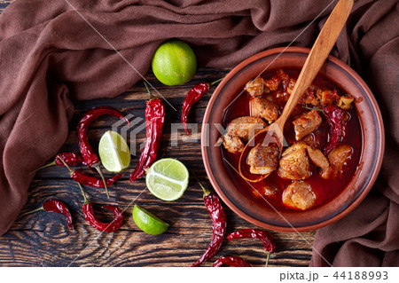 Carne Adobada in a clay bowl 44188993