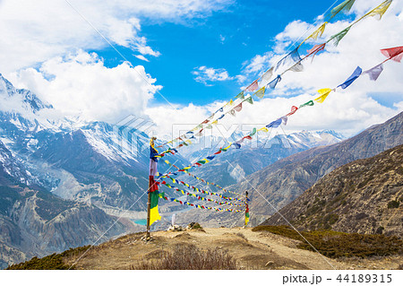 Rows of colored flags over the Himalayas, Nepal.  44189315