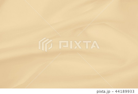 Smooth elegant golden silk or satin luxury cloth Smooth elegant golden silk or satin luxury cloth 44189933