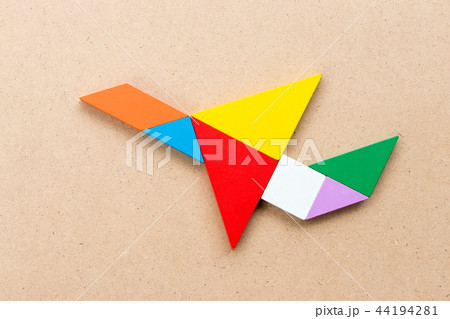 Color tangram puzzle in flying airplane shape Color tangram puzzle in flying airplane shape 44194281