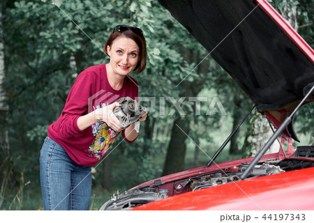 young girl with the red car young girl with the red car 44197343