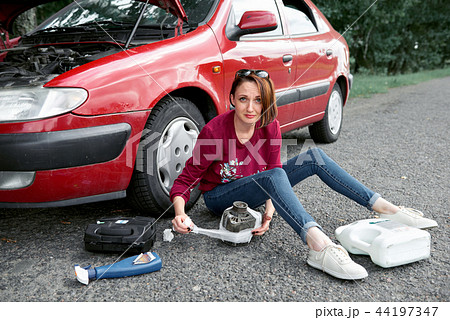 young girl with the red car young girl with the red car 44197347