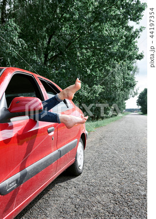 young girl with the red car young girl with the red car 44197354