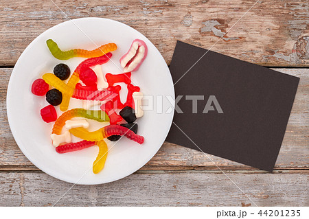 Colorful chewy candies on plate. Colorful chewy candies on plate. 44201235