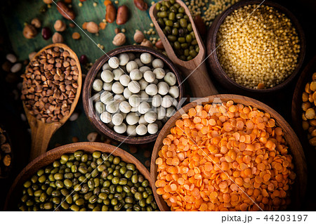 Raw legume on old rustic wooden table. Raw legume on old rustic wooden table. 44203197