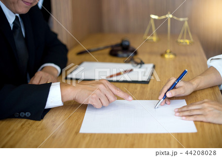 Judge gavel with Justice lawyers having meeting Judge gavel with Justice lawyers having meeting 44208028