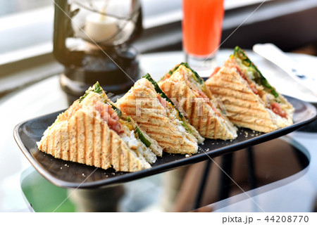 Sandwiches on plate, Grilled bread with lettuce. Sandwiches on plate, Grilled bread with lettuce. 44208770
