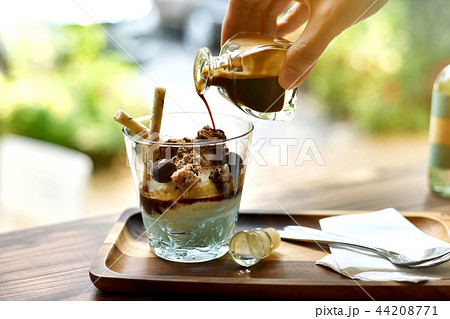 Coffee and dessert, Pouring coffee drink in sweet. 44208771
