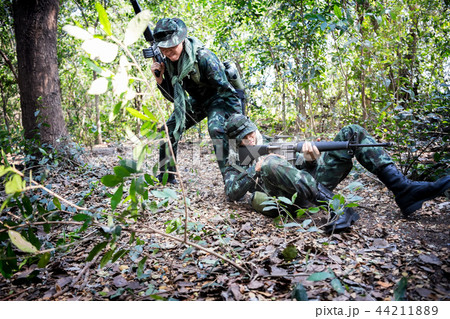 Asian army soldier during rescue operation evacuat 44211889