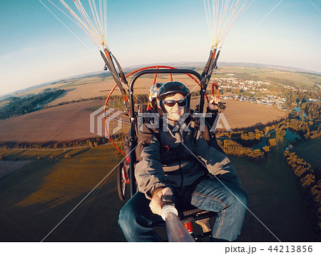 Powered paragliding tandem flight Powered paragliding tandem flight 44213856