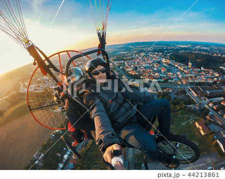 Powered paragliding tandem flight Powered paragliding tandem flight 44213861