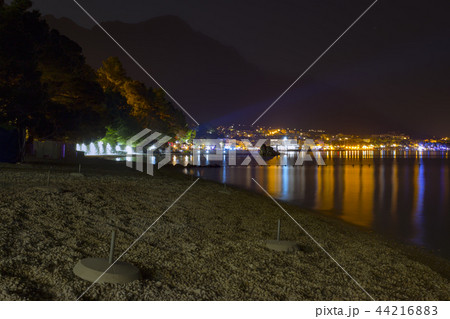 Night view of the illuminated seaside town Night view of the illuminated seaside town 44216883