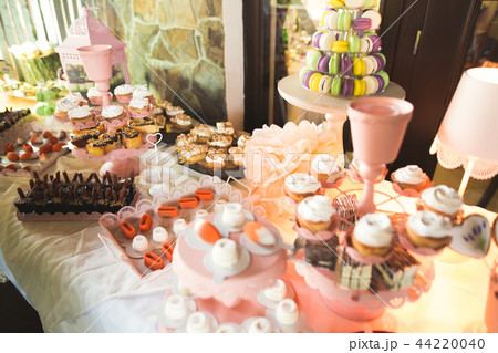 Different kinds of baked sweets on a buffet 44220040
