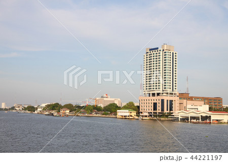 Business building on curve water front. Business building on curve water front. 44221197
