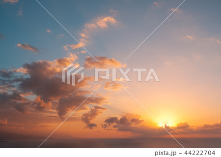 sunset sky above ocean background - sky over water 44222704