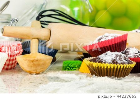Chocolate muffins in paper case 44227665