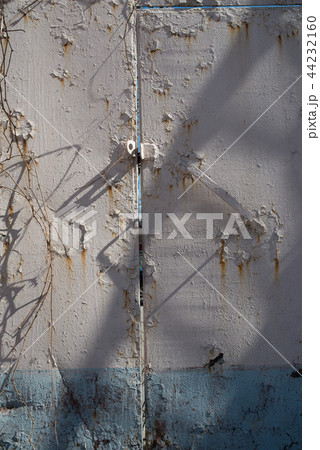 Rust rusty corroded oxidize colorful door used metal sheet plate pattern wallpaper crack grunge Rust rusty corroded oxidize colorful door used metal sheet plate pattern wallpaper crack grunge 44232160
