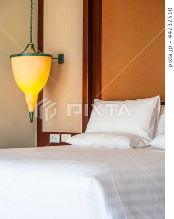 Comfortable pillow on bed decoration in hotel bedroom Comfortable pillow on bed decoration in hotel bedroom 44232510