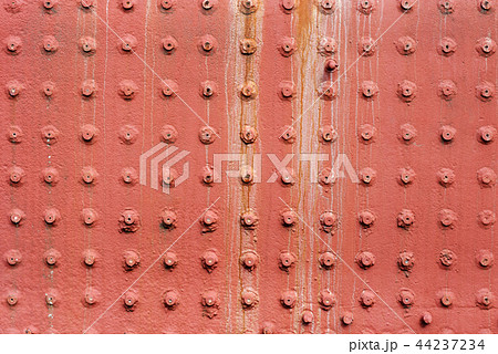 Riveted metal wall surface 44237234