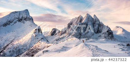 Panorama of Mountaineer standing on top of snowy 44237322