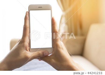 Hands working on a smart phone. 44241233