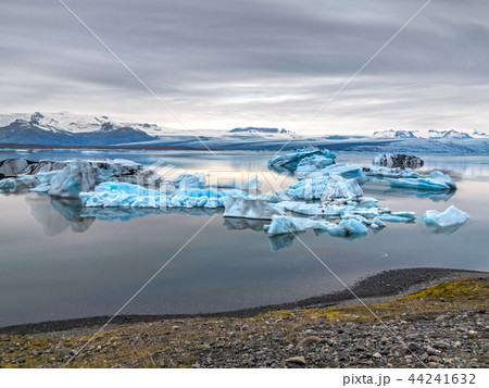 blue icebergs floating in jokulsarlon, ultra long exposure 44241632