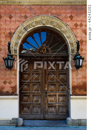 Vintage wooden door in European style Vintage wooden door in European style 44243201