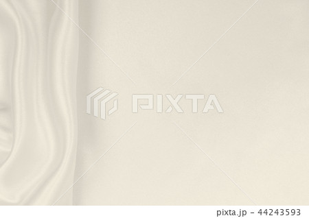 Smooth elegant golden silk or satin luxury cloth 44243593