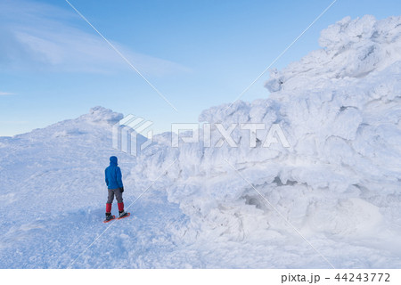 Tourist walks in the winter mountains Tourist walks in the winter mountains 44243772