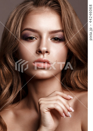 Beautiful girl with creative colorful make up. Beauty face. Beautiful girl with creative colorful make up. Beauty face. 44246068