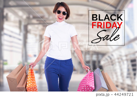 asian girl holding shopping bags asian girl holding shopping bags 44249721