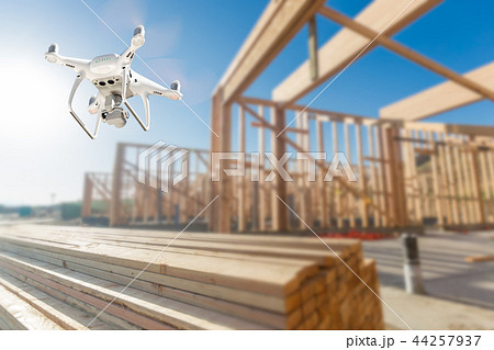 Drone Quadcopter Flying and Inspecting Construction Site Drone Quadcopter Flying and Inspecting Construction Site 44257937