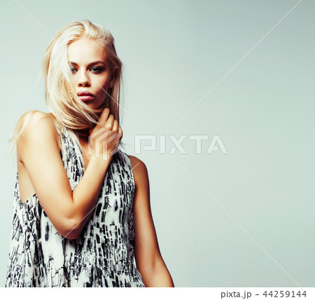 young pretty stylish hipster girl posing emotional isolated on w 44259144