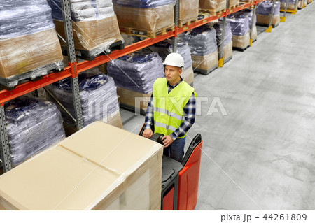 loader operating forklift at warehouse loader operating forklift at warehouse 44261809
